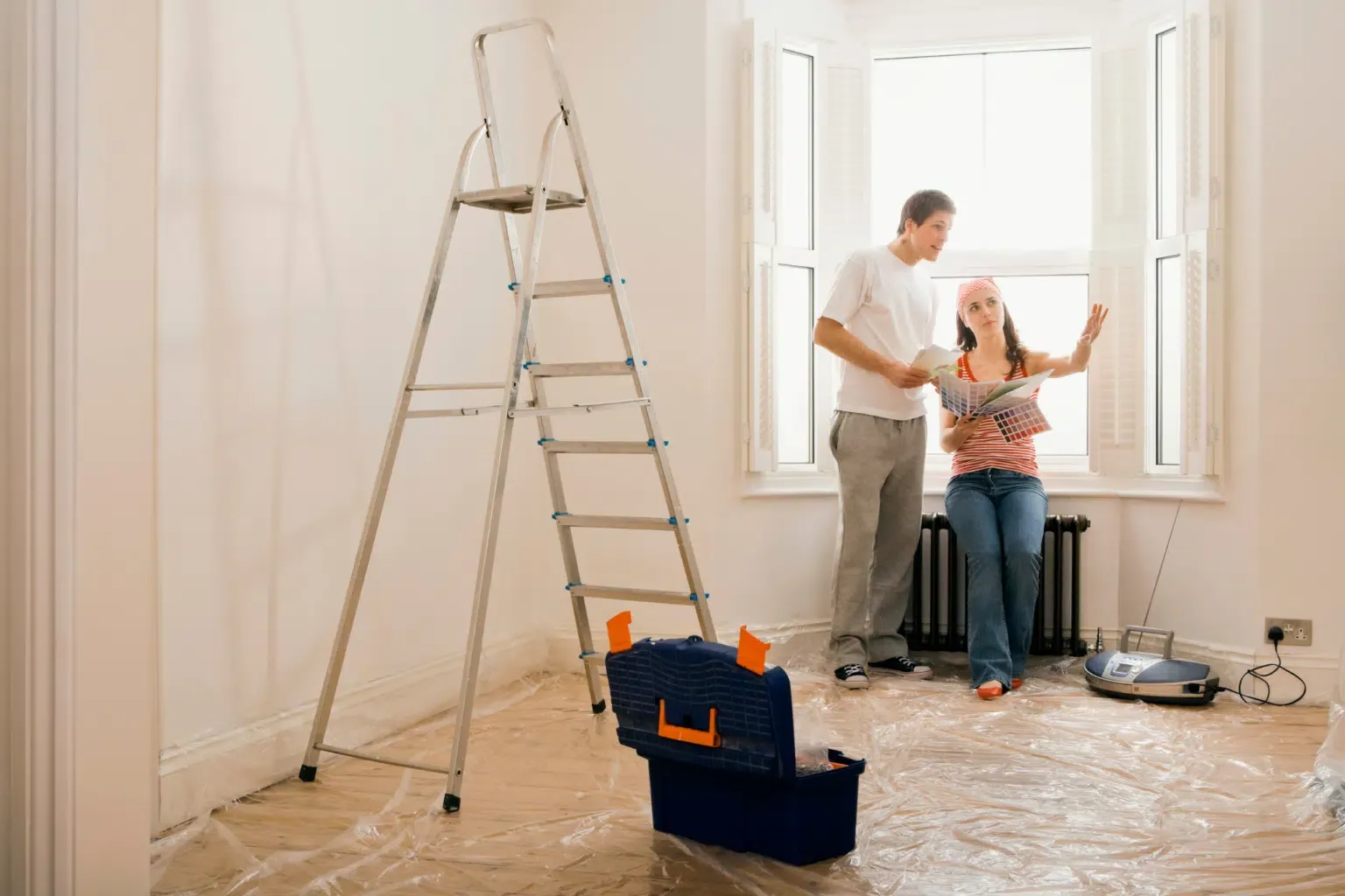 A couple planning to replace their windows themselves.